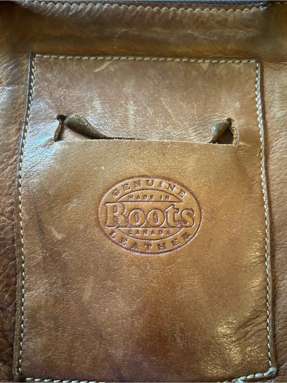 Roots, genuine leather, made in Canada Fringed Crossbody